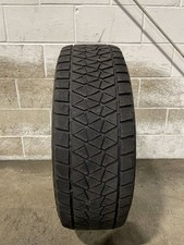 1x P26570r17 Bridgestone Blizzak Dm-v2 732 115 R Used Tire 2657017