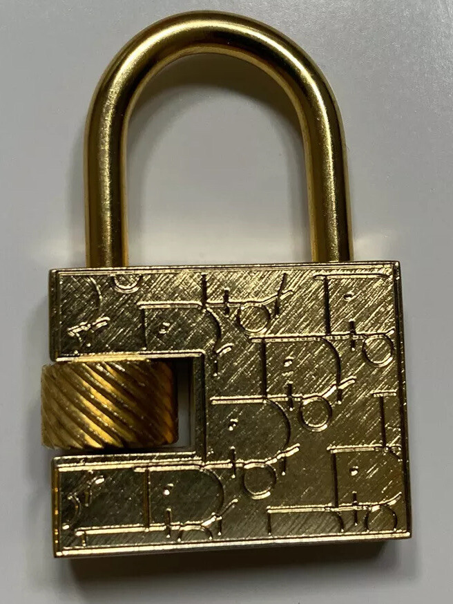 Vtg CHRISTIAN DIOR Monogram Keyless Screw Padlock Pendant Key