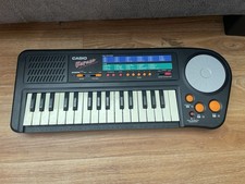 CASIO Rapman Synthesizer Keyboard W/ Voice Ef...