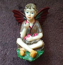 Fairy/Pixie Boy Figurine Ornament with Wings Sitting Holding Red Berries