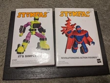 Stikfas Omega Male Super Villain & Omega Male Super Hero - Both In Box RARE
