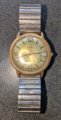 Vtg Mens Q TIMEX QUARTZ GOLD TONE Round Face Wrist Watch Water Resistant