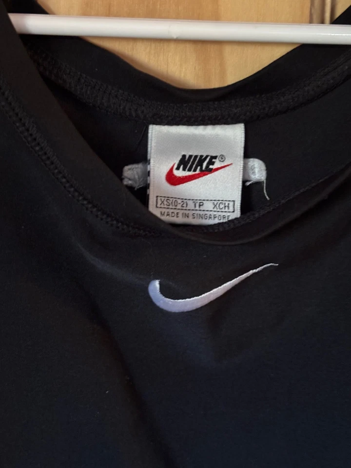 Body corto Nike para mujer talla XS negro Dri-FIT gimnasio Life. Usado una vez*ENVÍO GRATUITO Foto 2 de 4