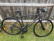 Triban RC 500 Hybrid Bike 700C Frame M Black Flat Bar Mechanical Disc Brakes