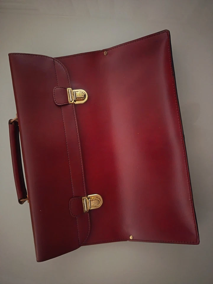 Pochette/porte-documents en cuir bordeaux de chez Gérard Hénon - Photo 1/4