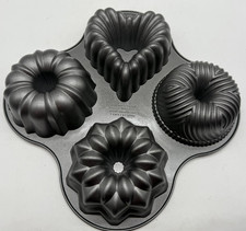 NORDIC WARE Bundt Quartet Cake Pan ? 4 Mini Bundt in very good used condition.