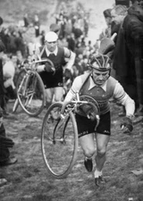 French cyclist Jean Robic carries his bike during Buttes � Morel c- 1950s Photo