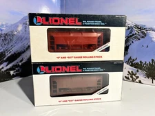 2 1987 Lionel "FACTORY ERROR" ore cars. 6-19300 & 6-19301 one side not lettered