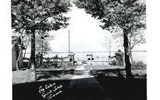 Log Cabin SPIRIT LAKE Famed Landmark Log Cabin IA RPPC Vintage Postcard