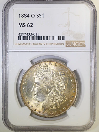 1884 O Morgan Silver Dollar NGC MS62 Nice Orange and Blue Toning