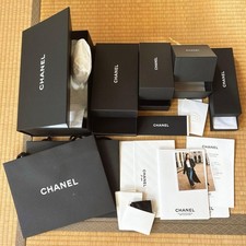 Chanel shopper bag, empty box, magnet, instruction manual, and accessory set