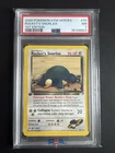 2000 POKEMON GYM HEROES 1ST EDITION #33 ROCKET'S SNORLAX PSA 7