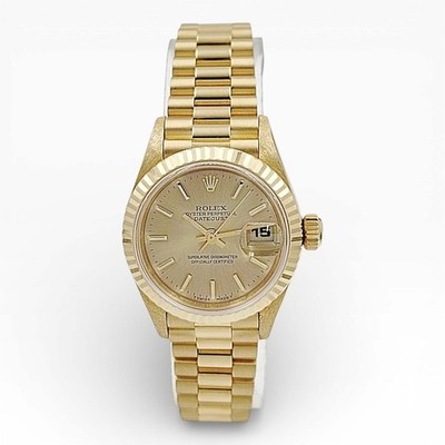 Rolex 26mm Presidential 18K Gold Watch w/Champagne Dial & Fluted Bezel. (69178)