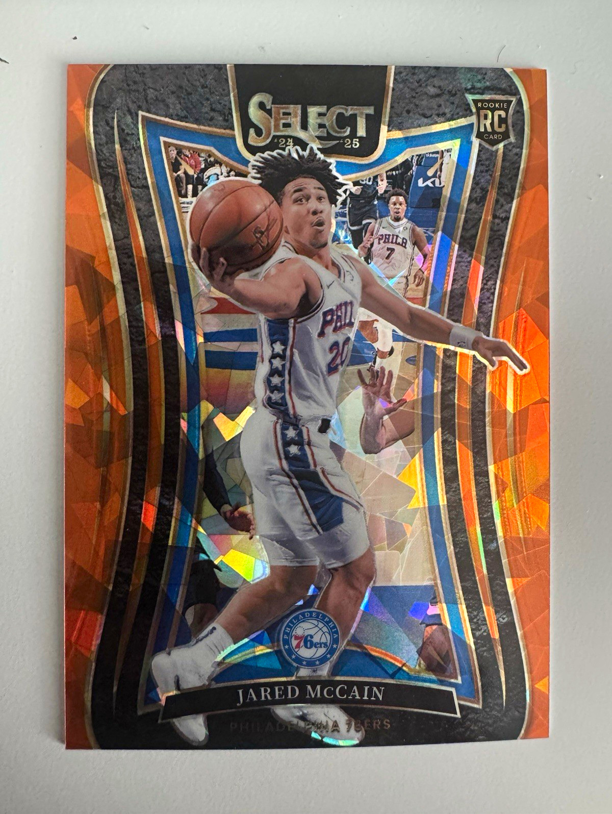 Jared McCain 2024-25 Panini Select Mezzanine Orange Cracked Ice Prizm /275 RC