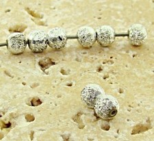 50 VINTAGE SILVER TEXTURED ACRYLIC 4mm. ROUND BEADS 812