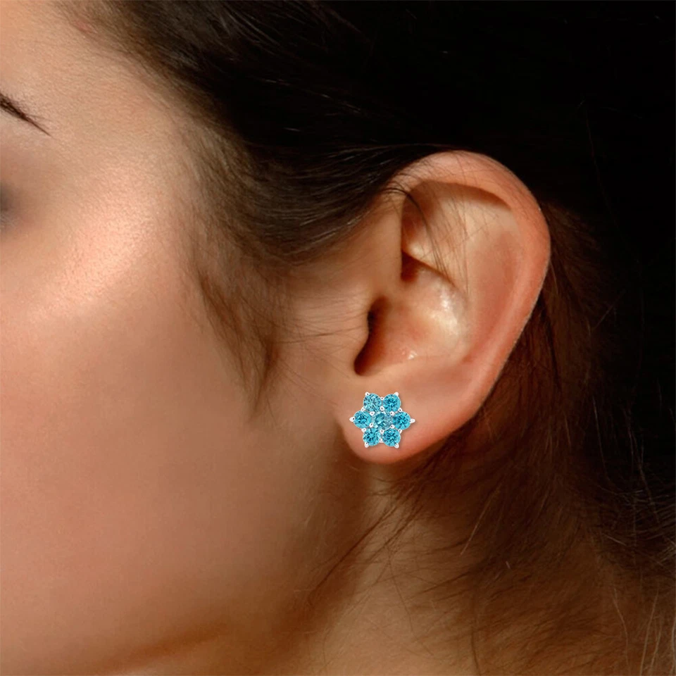 Aretes Flor Corte Redondo Topacio Azul Simulado Chapados en Oro 14K Foto 4 de 4