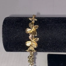 Charming Charlie Gold Tone Floral Bracelet with White Marble Stone