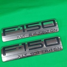 2004-2008 FORD F-150 XLT 5.4L TRITON FRONT FENDER EMBLEM 4L34-16B114-FB PAIR