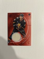2025-26 UD SP Game Used Red Jersey Parallel Jonathan Huberdeau Calgary Flames
