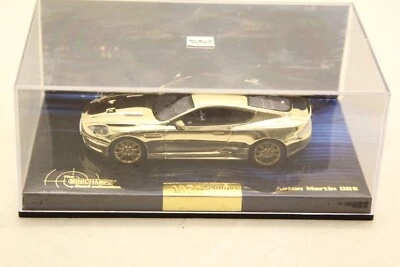 MiniChamps - 1:43 - Aston Martin DBS Gold Plated - 0074/2016 pcs - Photo 1/4