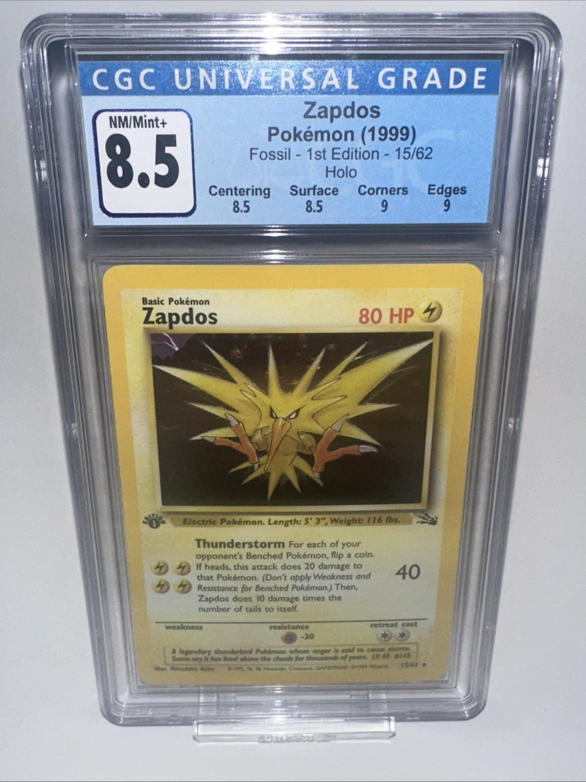 1st Edition Zapdos 15/62 Fossil Holo CGC 8.5