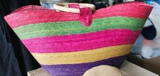 Colorful handwoven Mexican palm straw market beach tote bag.