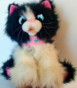 stuffed cat that meows and purrs