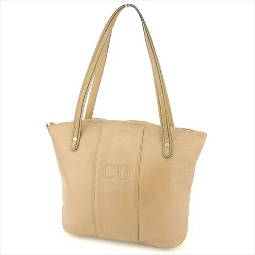 Sac fourre tout Dior beige cuir or femme unisexe authentique d'occasion T9381