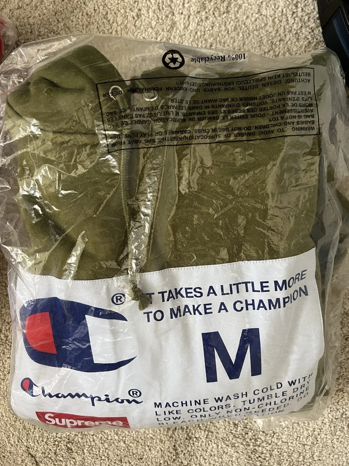 Sweat à capuche Supreme Champion Label Meduim neuf 