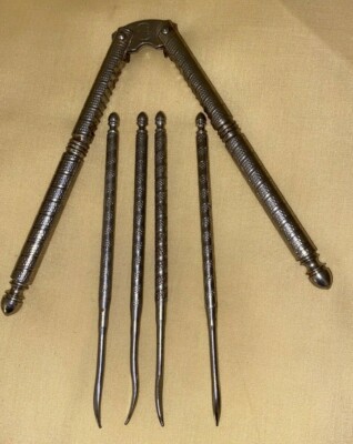 Vintage H.M.Q. nutcracker with four pics