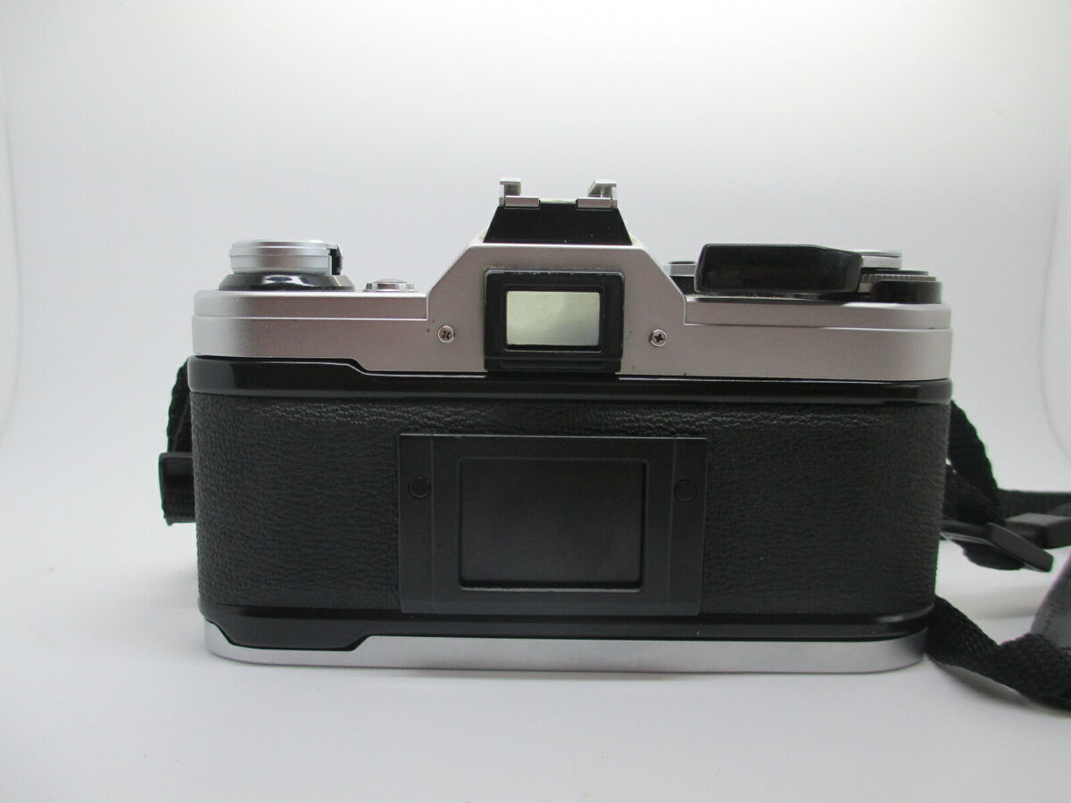 Canon AE-1 35mm SLR Film Camera with Canon 50mm f/1.8 FD Canon AE-1 35mm SLR Film Camera with Canon 50mm f/1.8 FD