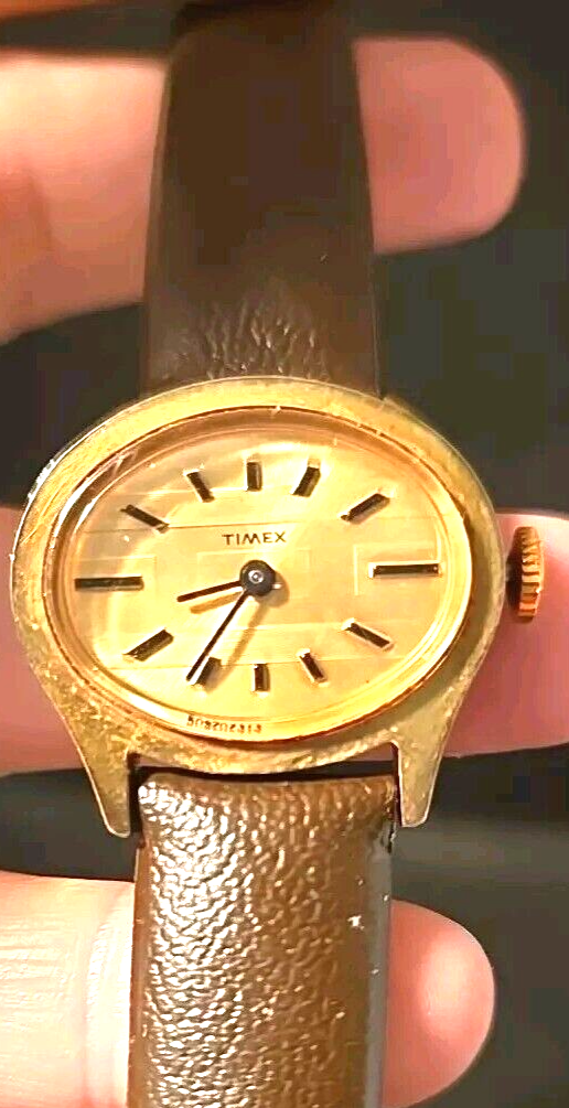 Vintage Timex Gold-Tone Oval Manual Wind Watch with Cream Dial for Women