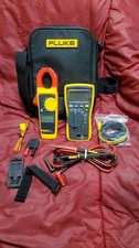 FLUKE 116 MULTIMETER AND 323 CLAMP ON  METER COMBO, FLUKE LEADS,WRIST STRAP