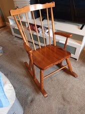 Wooden rocking chair, hardly used, very good condition.