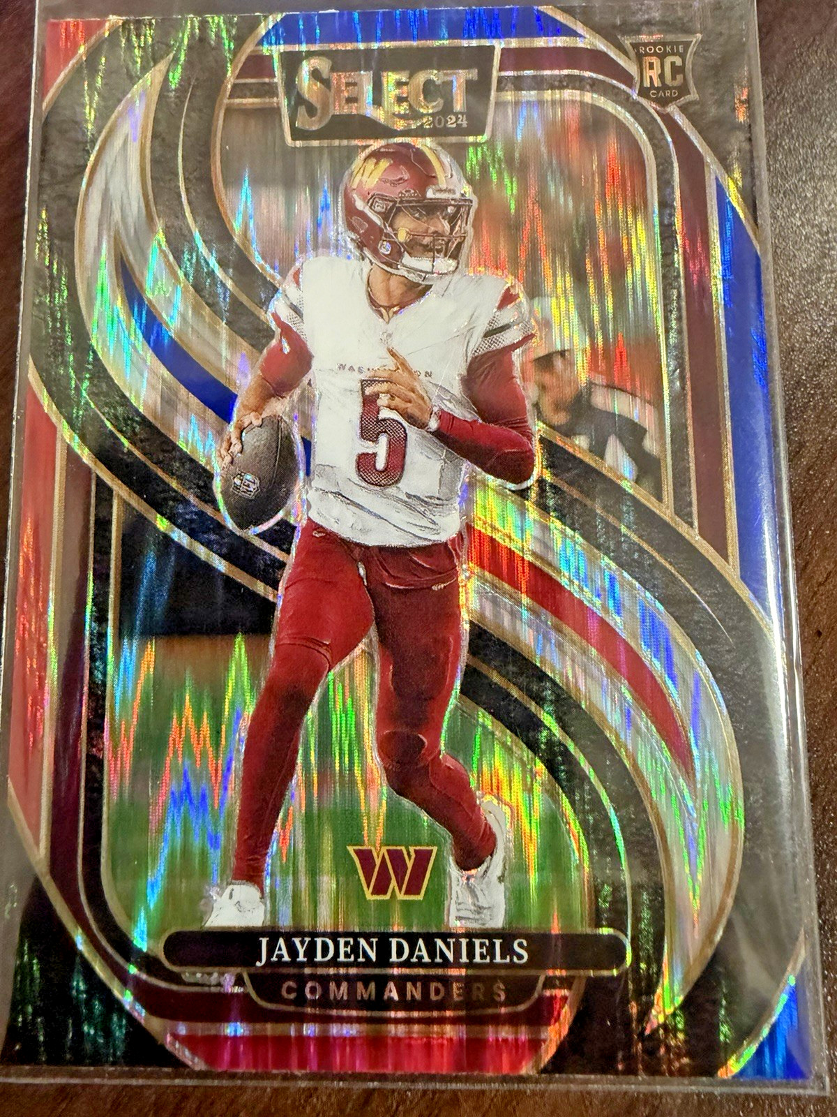 2024 Panini Select - Premier Level Jayden Daniels #112 Red & Blue Shock Prizm RC