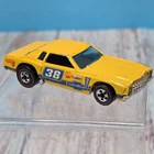 Hot Wheels Redline 1975 Monte Carlo Stocker Yellow Flying Colors