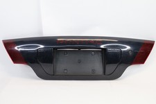 2000-2002 Pontiac Sunfire Coupe Rear Deck Trunk Lid License Tailight Retainer 2000-2002 Pontiac Sunfire Coupe Rear Deck Trunk Lid License Tailight Retainer