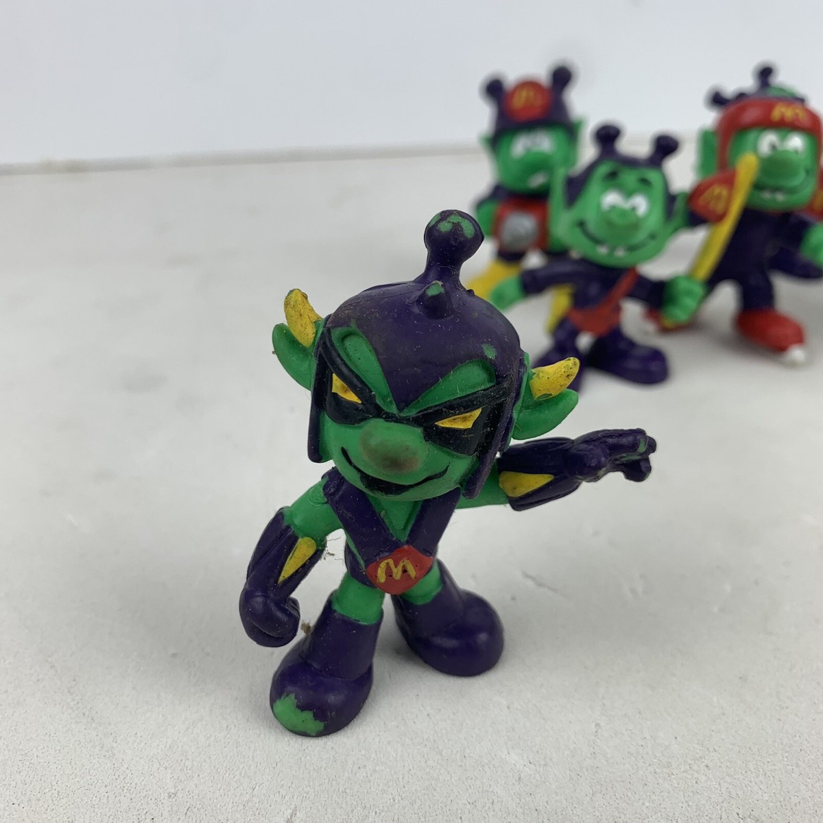 Lot of 9 1980s Mcdonalds Astroniks Various Years Green Alien Ray