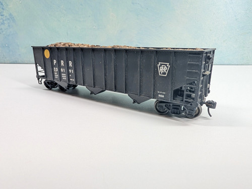 Tolva Bachmann HO 100 toneladas con carga de astillas de madera Pennsylvania #230191 ruedas de metal | Condition: Used
