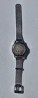 This wristwatch featuring a Walking Liberty half dollar coin With A mesh band.