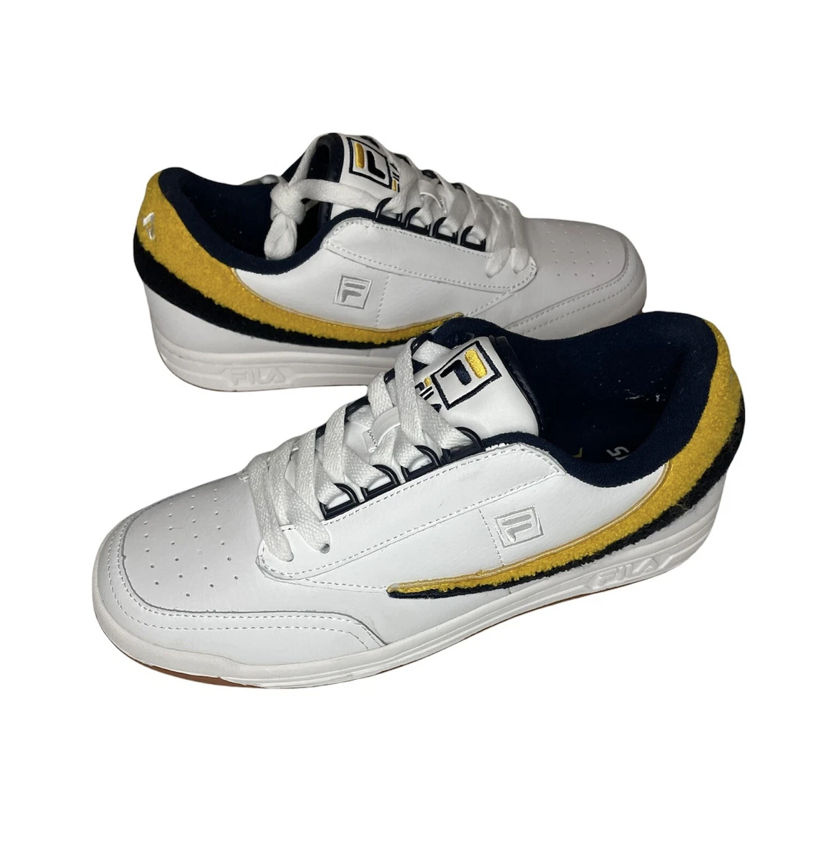 Fila gold store and white