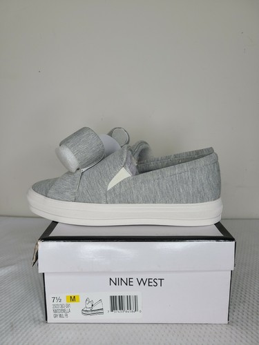 nine west black slip on sneakers