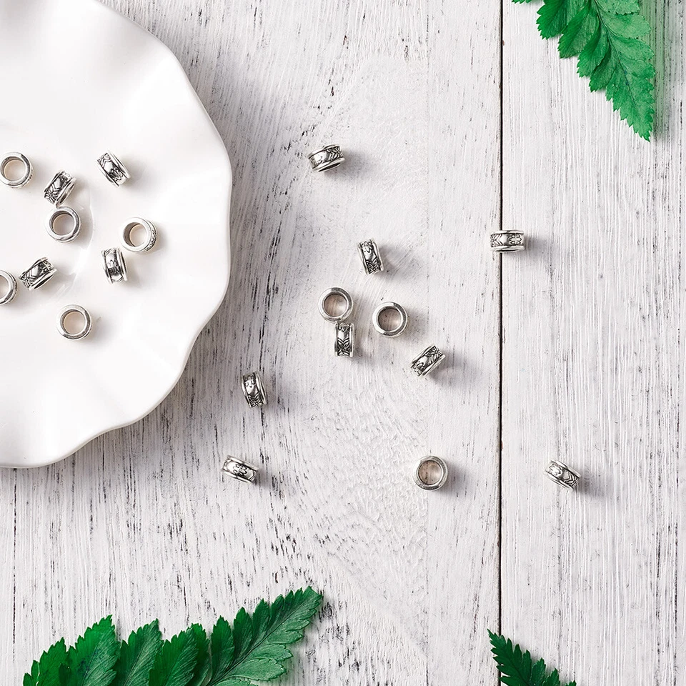 Anillo de aleación tibetano 20 piezas cuentas de metal talladas espaciadores de agujeros grandes sin níquel 8x4 mm Foto 2 de 4