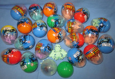 a Lot of 21 Small Capsule Toys with small put together Gundams inside