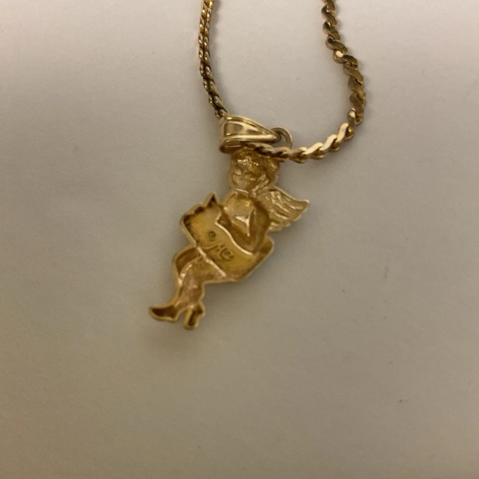 Collar Colgante MICHAEL ANTHONY 14k ORO AMARILLO QUERUBÍN 2000 AÑO NUEVO 6 gramos Usado en Excelente Condición Foto 3 de 4