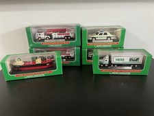 Lot of 6 Hess Mini Miniature Trucks Collectible Toys- New in Box Never Open