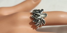 ADORABLE SILVER TONE FASHION RING SIZE 7 FLOWER DESIGN