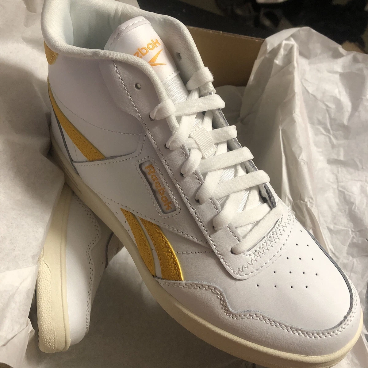 Reebok high tops gold deals
