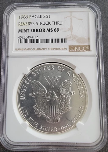 1986 Silver American Eagle REVERSE STRUCK THRU MINT ERROR MS 69