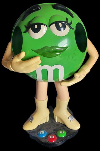 Green M&M's character store display. Advertising candy & nuts statue